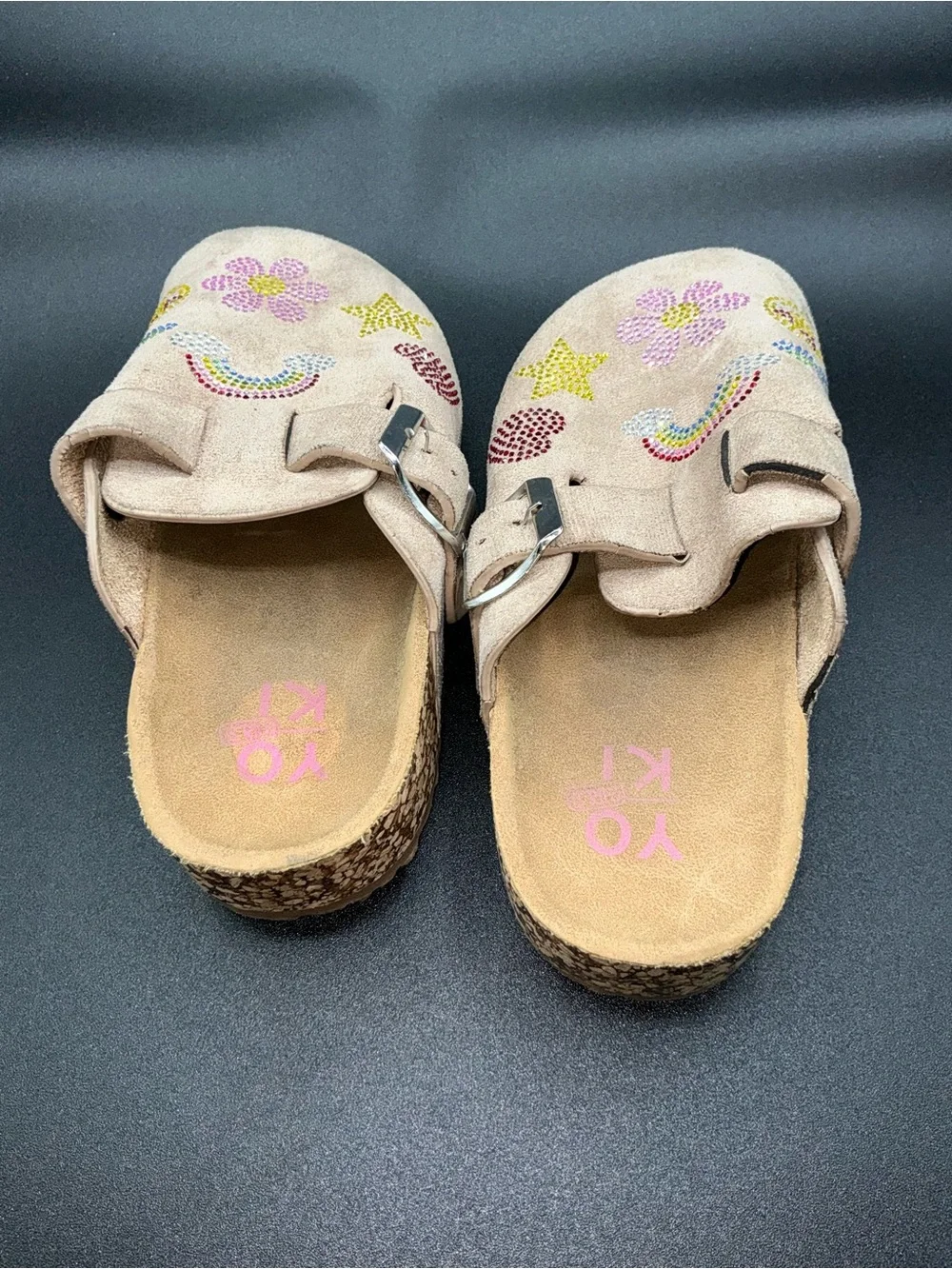 Yoki Gienna girls' taupe faux suede clogs featuring rhinestone embellishments.